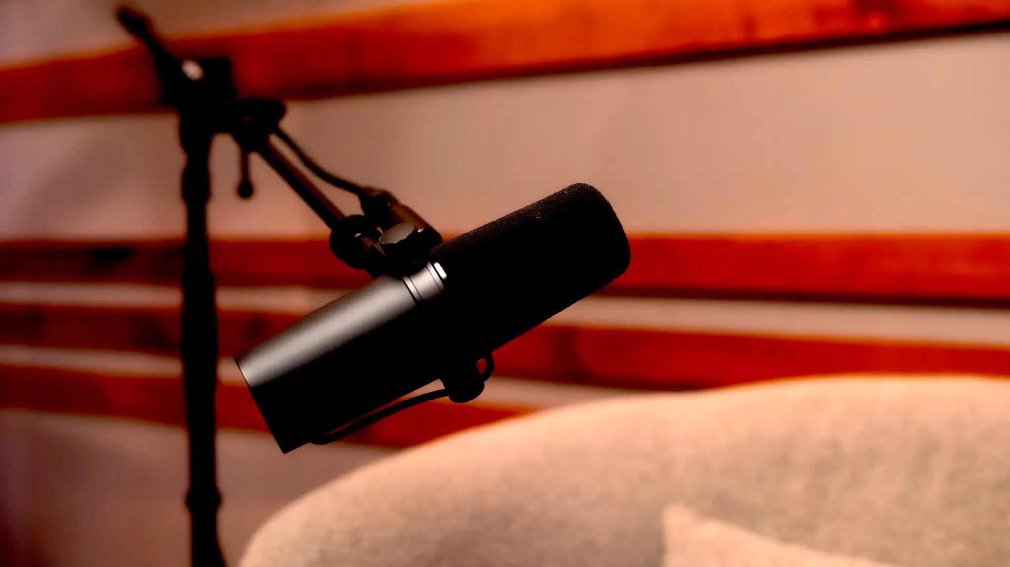 Dynamic microphone on boom arm in studio