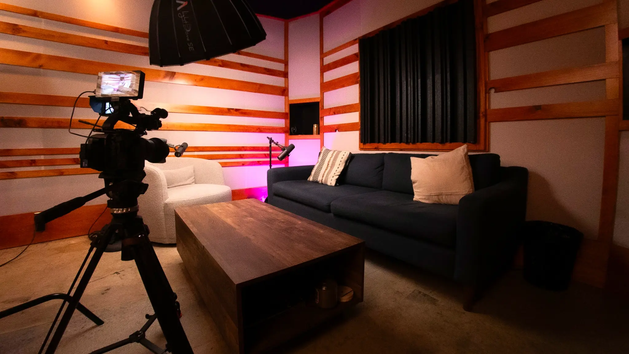 Video podcast recording setup with 4K camera and sofa